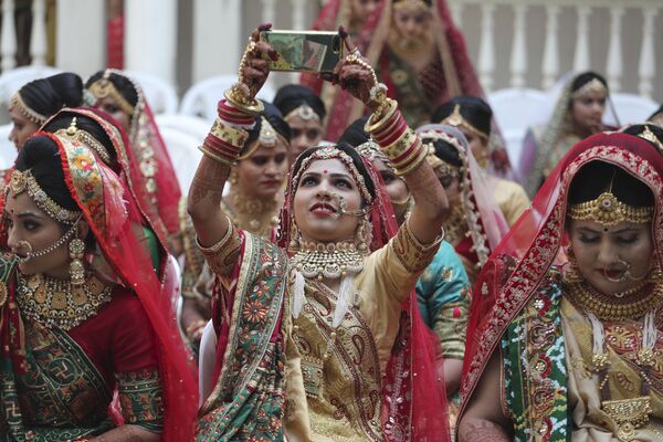 مراسم عروسی دسته‌جمعی در احمدآباد هند - اسپوتنیک ایران  