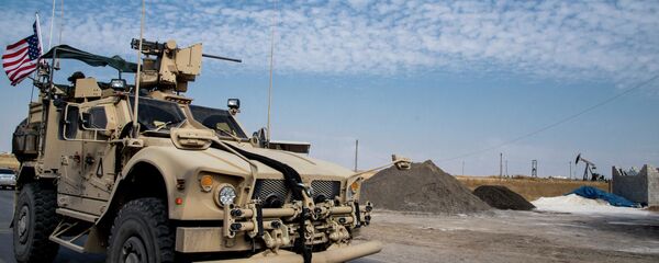 خروج نیروهای ائتلاف آمریکایی از پایگاه نظامی در عراق خروج نیروهای ائتلاف آمریکایی از پایگاه نظامی در عراق - اسپوتنیک ایران