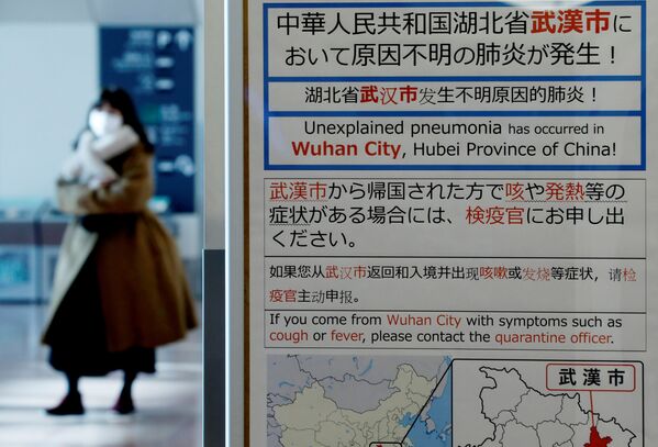 اطلاعیه درباره شیوع ویروس کرونا در شهر ووهان چین در فرودگاه بین المللی توکیو - اسپوتنیک ایران  
