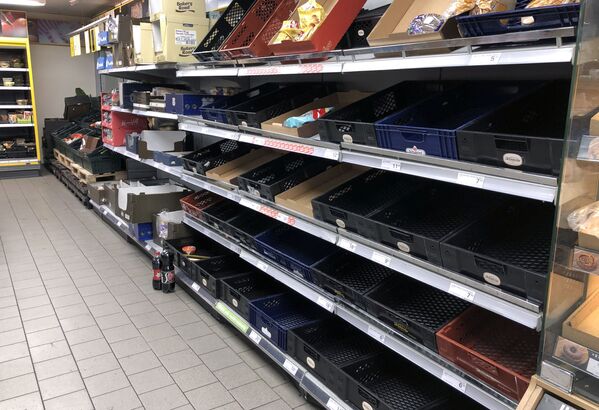 قفسه های خالی سوپر مارکت در کپنهاگ، دانمارک
 - اسپوتنیک ایران  