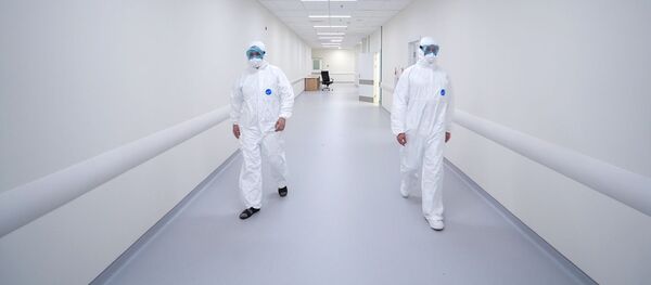 کارکنان مرکز پزشکی در مجموعه بیمارستانی کامونارکا کارکنان مرکز پزشکی در مجموعه بیمارستانی کامونارکا - اسپوتنیک ایران