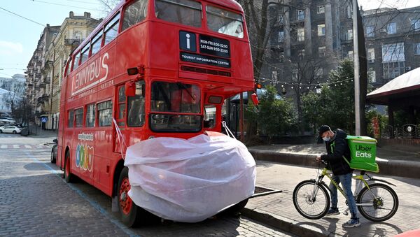اتوبوس با ماسک در اوکراین - اسپوتنیک ایران  