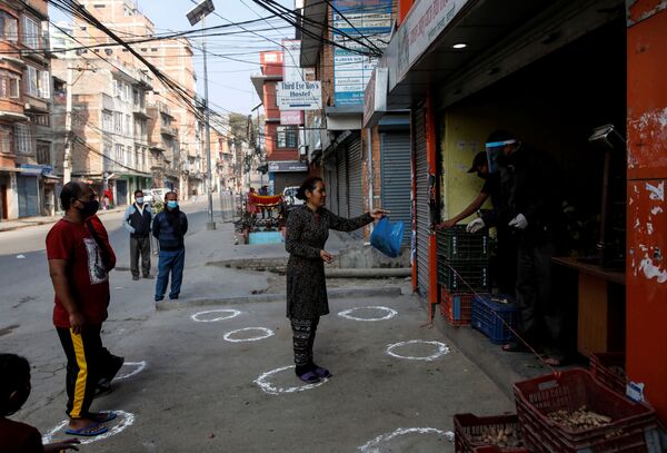 رعایت فاصله اجتماعی
نپال - اسپوتنیک ایران  