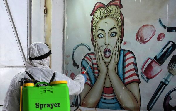 ماسک، گرافیتی،هنر خیابانی در مقابل کرونا
بغداد - اسپوتنیک ایران  
