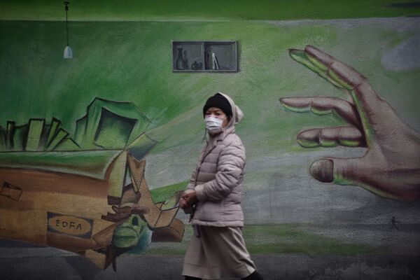 ماسک، گرافیتی،هنر خیابانی در مقابل کرونا
چین - اسپوتنیک ایران  