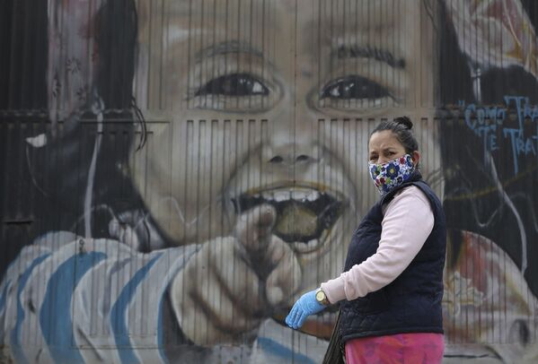 ماسک، گرافیتی،هنر خیابانی در مقابل کرونا
کلمبیا - اسپوتنیک ایران  