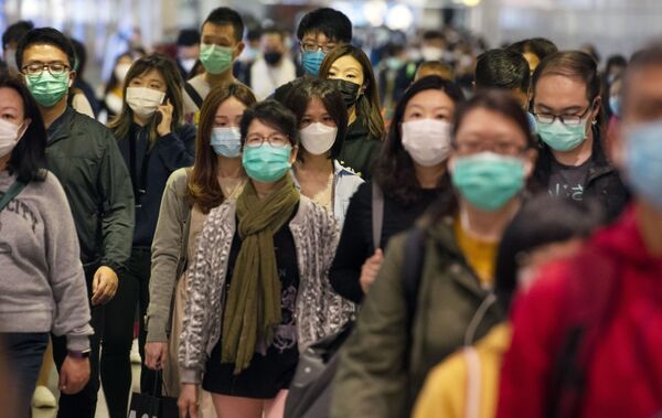 مسافرین با ماسک در مترو هنگ کنگ - اسپوتنیک ایران  