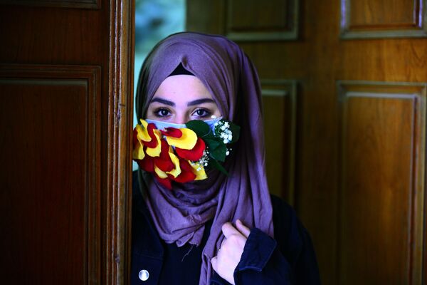 زن عراقی با ماسک - اسپوتنیک ایران  