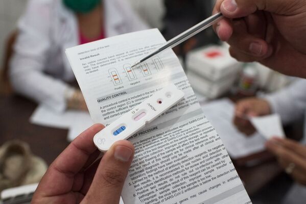 پزشکان در کاراکاس چگونه از فقرا تست کرونا ویروس می گیرند - اسپوتنیک ایران  