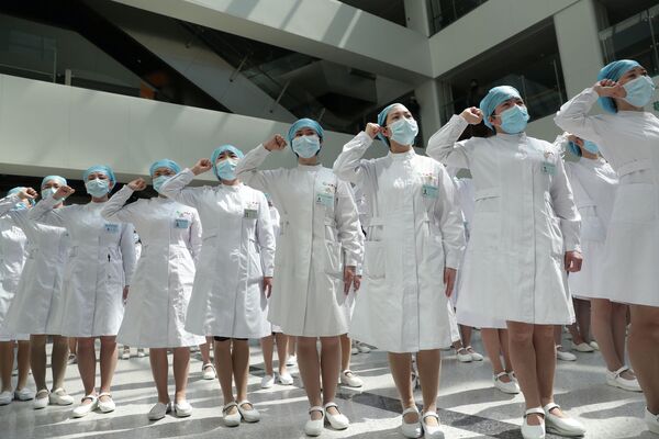 پرستاران در مراسم روز جهانی پرستار در بیمارستانی در چین
 - اسپوتنیک ایران  