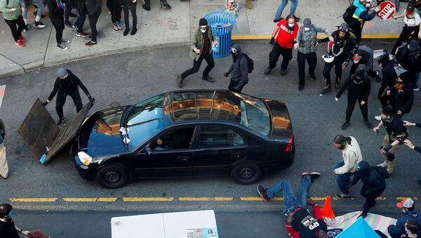 یک خودرو معترضین در سیاتل را زیر گرفت  - اسپوتنیک ایران  