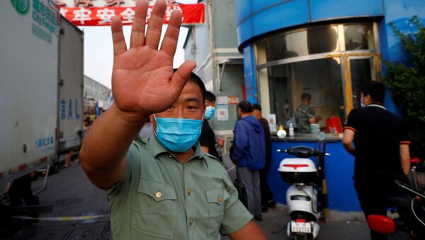 اعلام وضعیت فوق‌العاده در پکن به دلیل خطر شیوع کرونا - اسپوتنیک ایران  