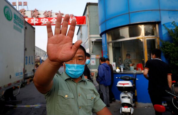 اعلام وضعیت فوق‌العاده در پکن به دلیل خطر شیوع کرونا - اسپوتنیک ایران  