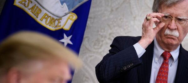  In this file photo taken on May 13, 2019, National Security Advisor John Bolton listens while US President Donald Trump speaks to the press before a meeting with Hungary's Prime Minister Viktor Orban in the Oval Office of the White House in Washington, DC. - Trump has no guiding principles and is unfit to be president, Bolton said in an interview released on June 18, 2020, to promote his explosive book. I don't think he's fit for office. I don't think he has the competence to carry out the job, Bolton told ABC News.  - اسپوتنیک ایران  
