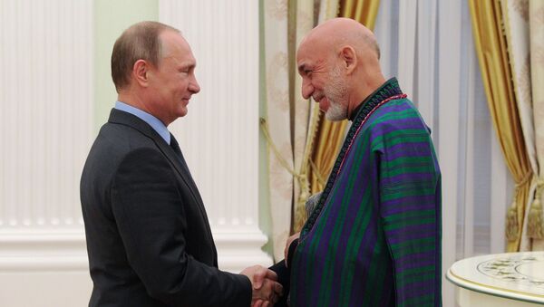 Президент России Владимир Путин и экс-президент Афганистана Хамид Карзай на встрече в Кремле - اسپوتنیک ایران  