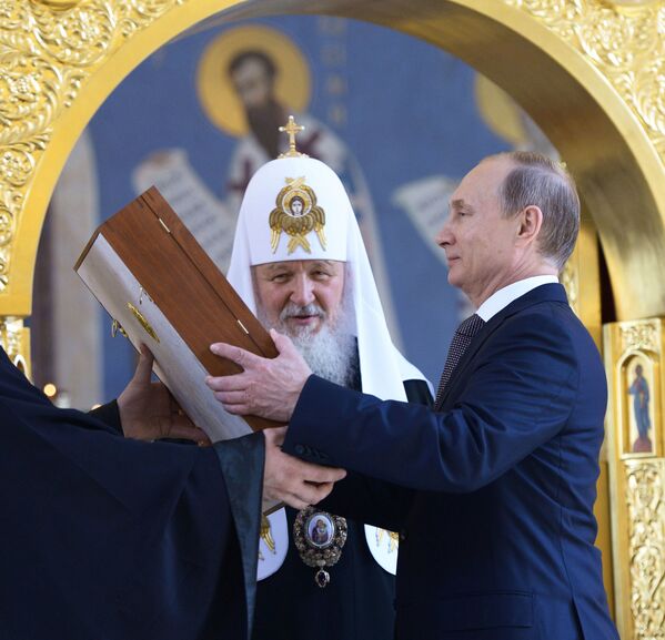 ولادیمیر پوتین، رئیس جمهور روسیه و کریل، رهبر کلیسای ارتدکس مسکو و سراسر روسیه - اسپوتنیک ایران  