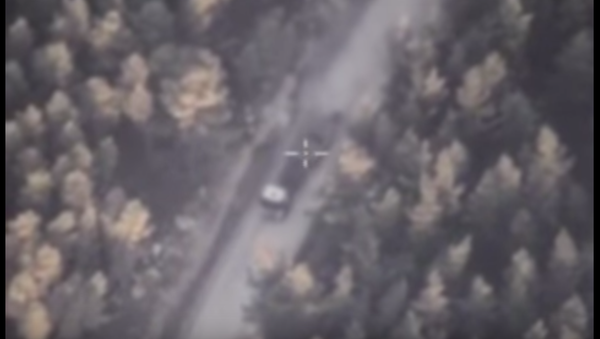 ویدئوی پناهگاه ماشین های نظامی داعش در نزدیکی تاسیسات غیر نظامی - اسپوتنیک ایران  