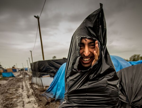 پناهجو در اردوگاه پناهجویان  فرانسه - اسپوتنیک ایران  