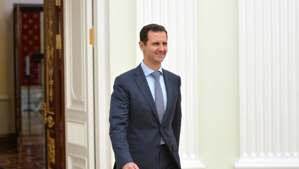 درخواست بشار اسد برای بازسازی سوریه - اسپوتنیک ایران  