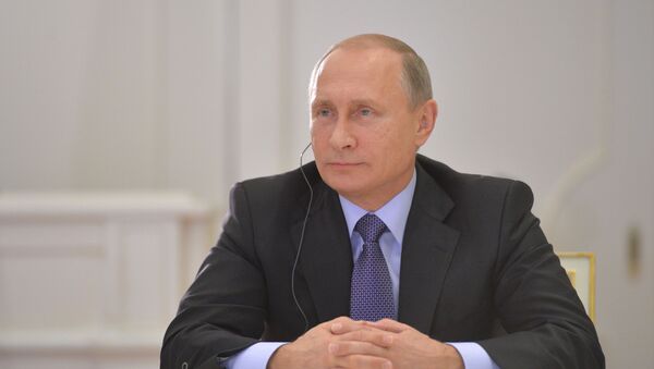 Президент России Владимир Путин во время видеоконференции с президентом Аргентины Кристиной де Киршнер - اسپوتنیک ایران  