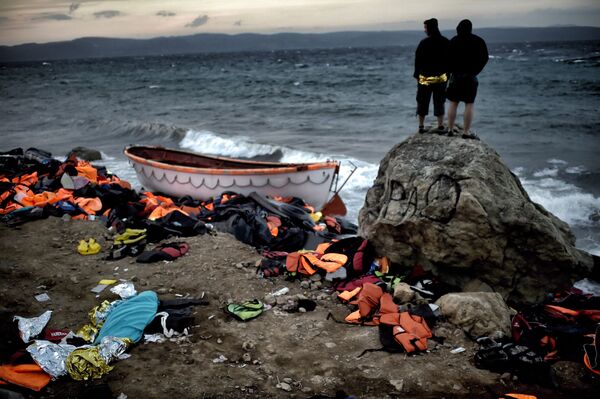 پناهجویان در ساحل لسبوس یونان - اسپوتنیک ایران  