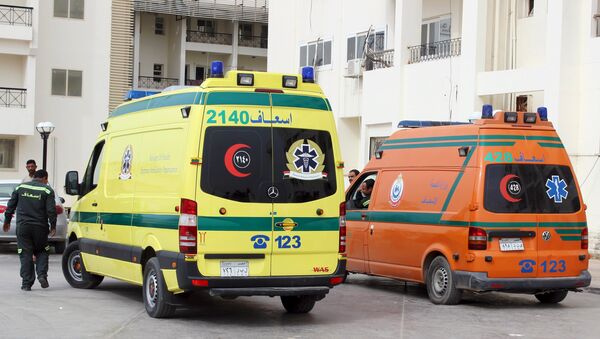 Ambulances carrying some dead migrants are seen in front of the hospital at Al Arish city, in the northern part of Sinai peninsula, Egypt, November 15, 2015 - اسپوتنیک ایران  